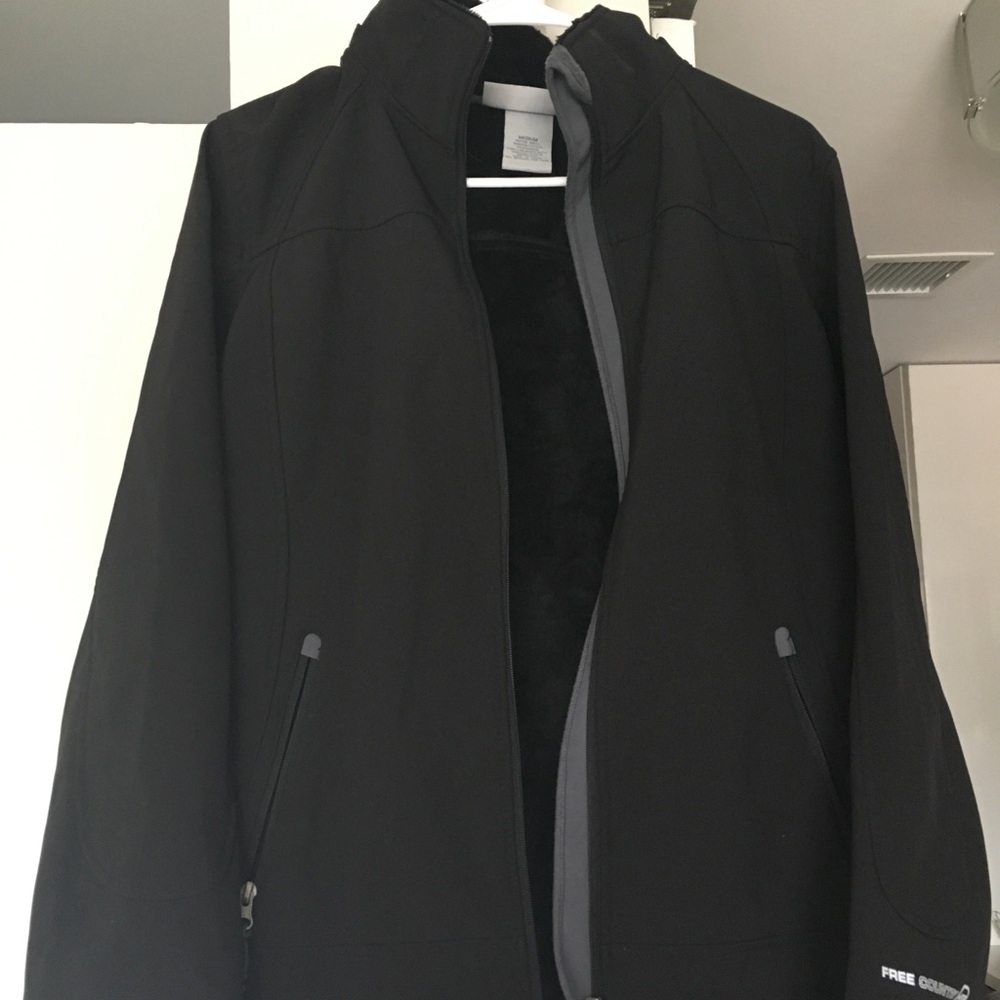 Winter zip up, brand new.